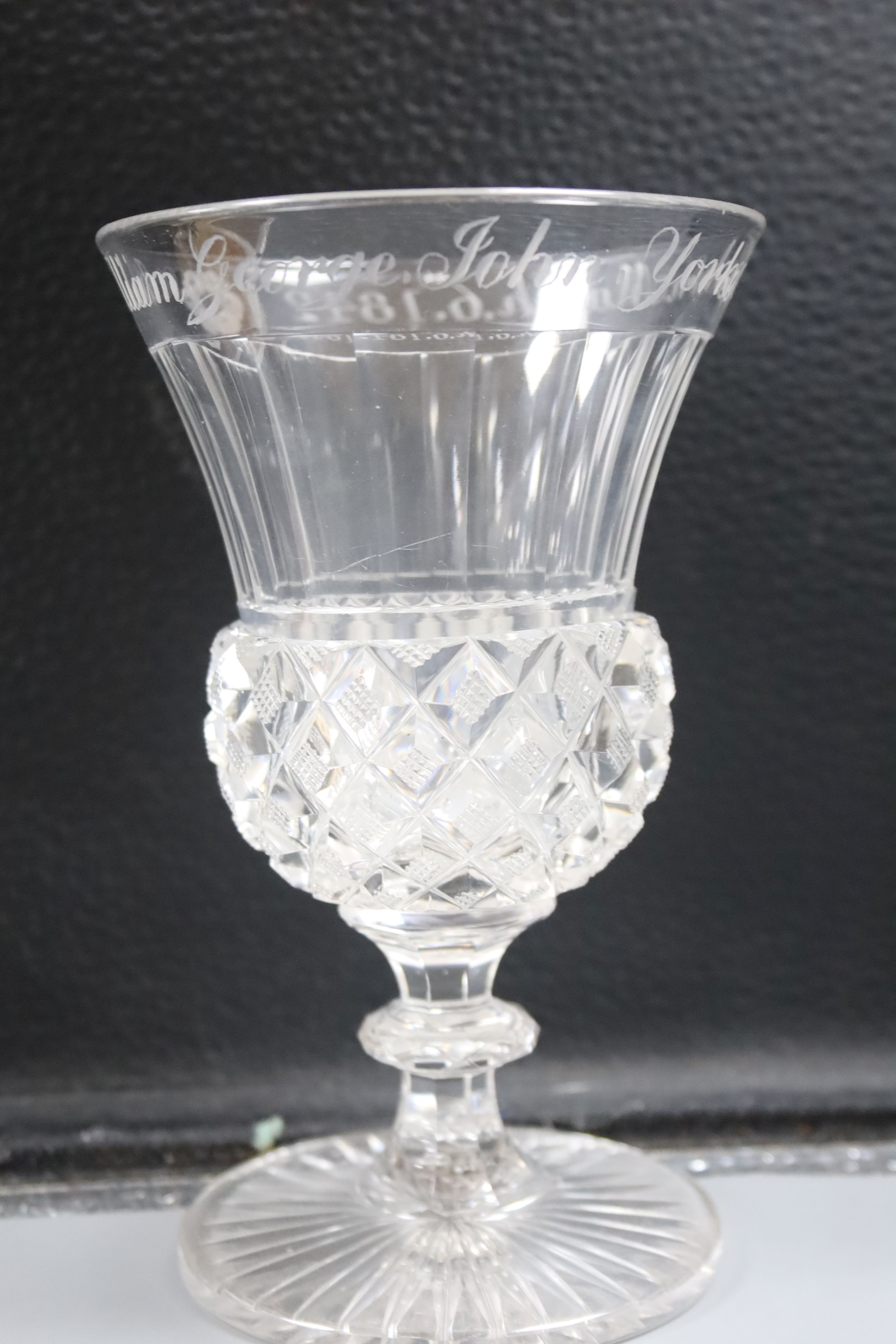 Four 18th century sweetmeat glasses, two with applied blue cable, a George III rummer and an 1842 commemorative goblet